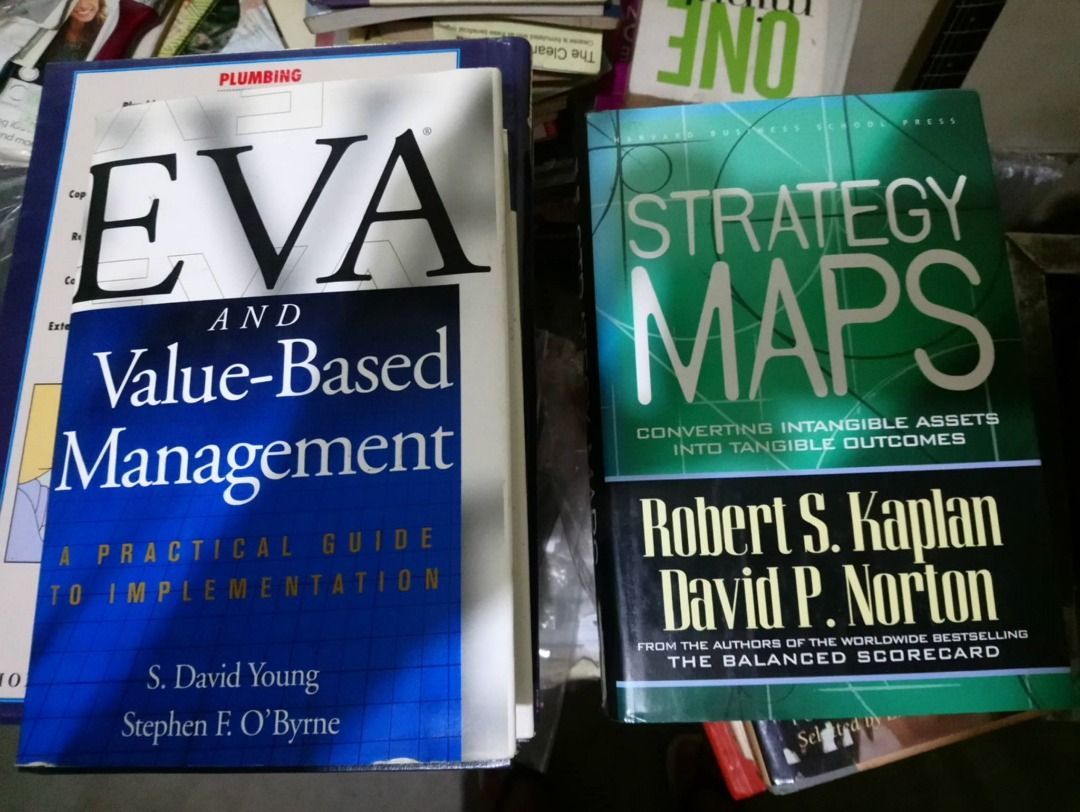 Financial and Project Management Books (Category: Textbooks) located in Pasig City. Submitted by in2vintagestuffs (Listing ID 1470007237, Image 1). Description: Two pre-loved business and strategy textbooks: Strategy Maps by Kaplan & Norton, and EVA and Value-Based Management by Young & O'Byrne. Both are paperbacks in decent condition, perfect for finance and management students or professionals. Number listed is not the price, please inquire for