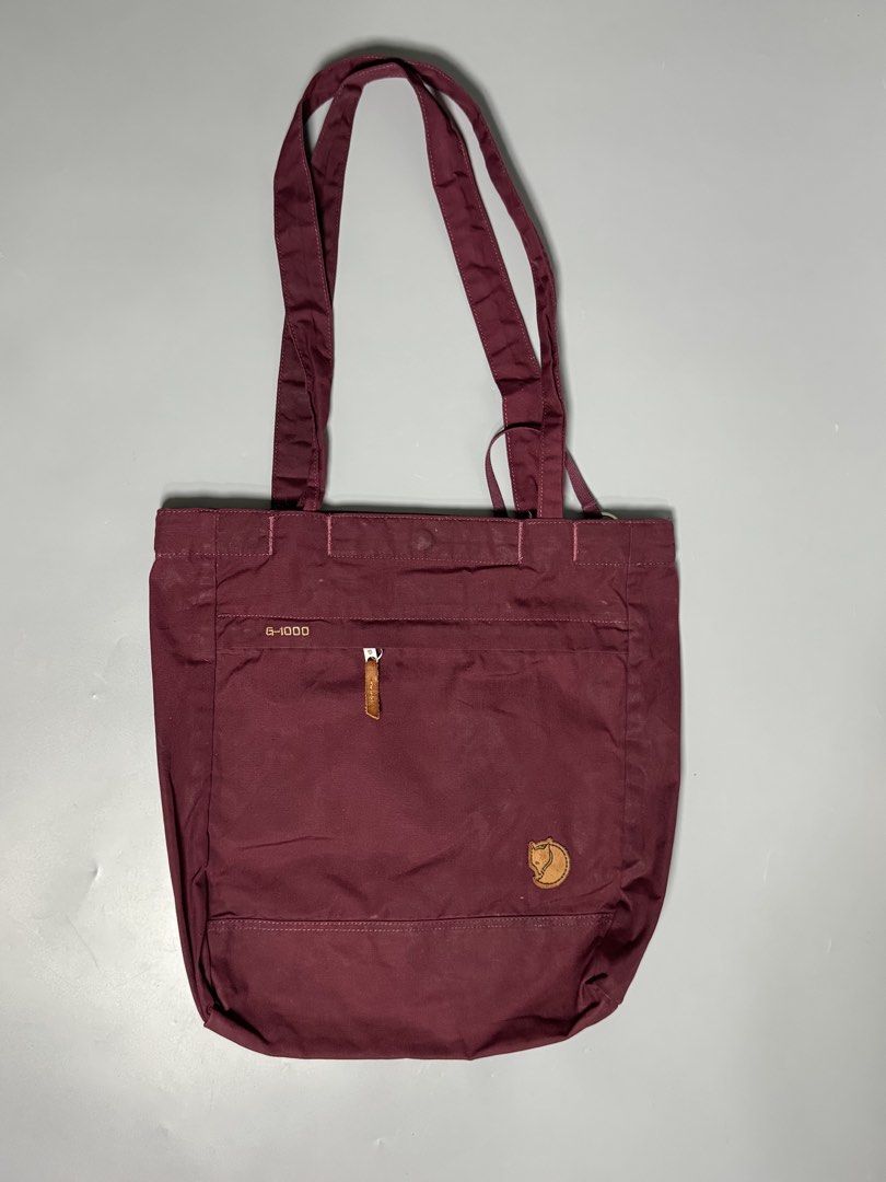 Fjallraven Tote (Category: Tote Bags) located in Las Pinas. Submitted by weryouat (Listing ID 1470033680, Image 1). Description: Fjallraven Tote No.3🚨🚨🚨⛰️ G1000 waxed fabric Excellent condition 100% Cotton Can be carried in hand or on the shoulder Made from G-1000 Original and G-1000 Heavy-duty Main compartment has buttoned closure and a self-closing construction that keeps contents in place when handles are tightened Zippered front pocket. Se