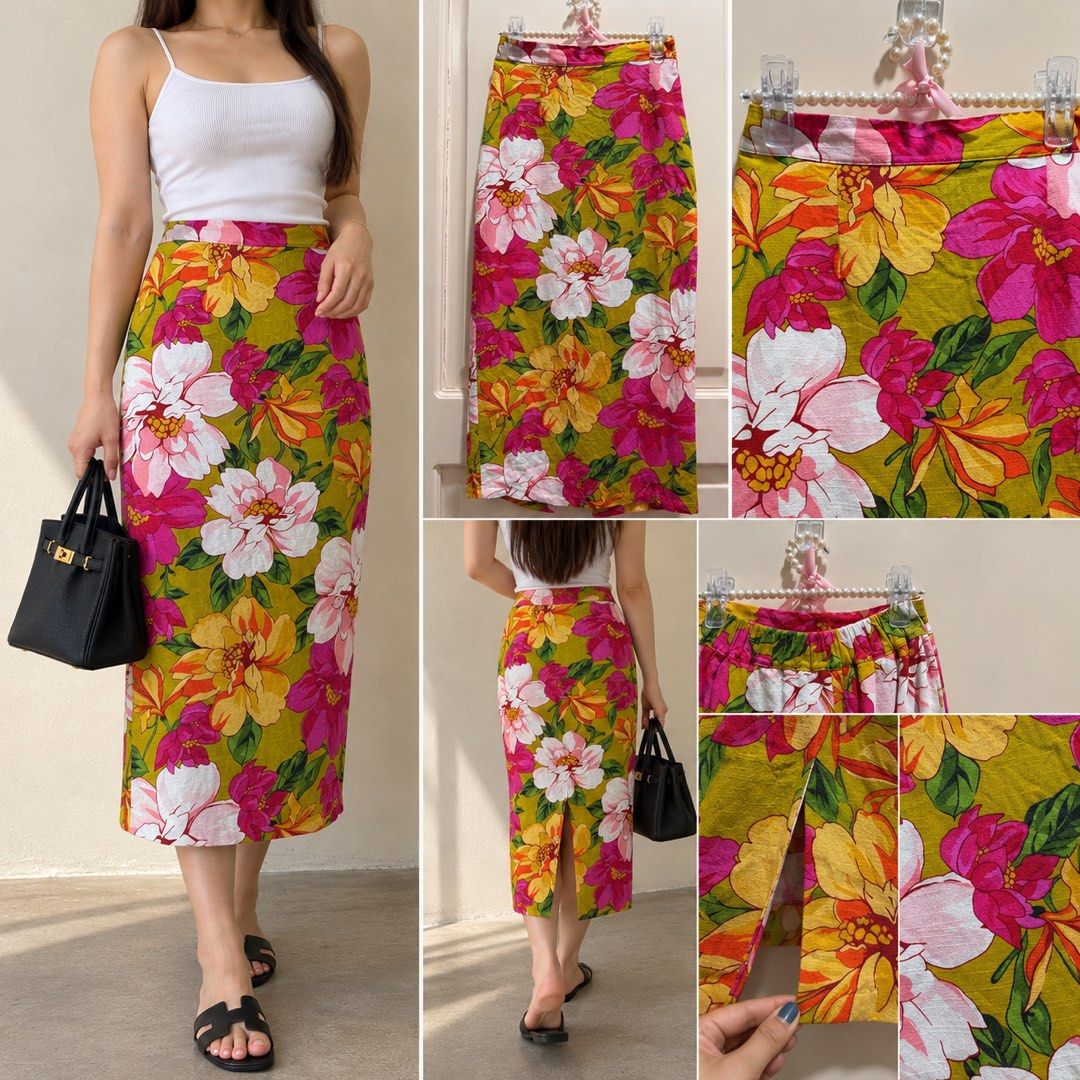 Floral Midi Skirt (Category: Skirts) located in Davao. Submitted by 2ndbase.dvo.ii (Listing ID 1470129210, Image 1). Description: - Style: Straight-cut midi skirt hitting below the calves - Design: Vibrant botanical floral pattern in pink, white, and yellow on an olive green base - Details: Structured waistband, clean zip closure, and back slit for comfort and movement - Fabric: Lightweight and breathable, ideal for warm weather - Condition: Bran
