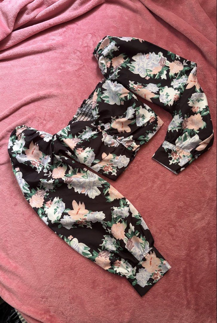 Floral Two-Piece Crop Top and Pants Set (Category: Sets or Coordinates) located in Manila. Submitted by coolflower-e6627b (Listing ID 1470097063, Image 1). Description: - Trendy black two-piece set with pastel floral print - Long-sleeved crop top with front buttons and stretchy smocked back - Matching long pants with stylish cuffed hems - Lightweight, breathable fabric for all-day comfort - Perfect for casual lakads, dates, or weekend chill - Mod
