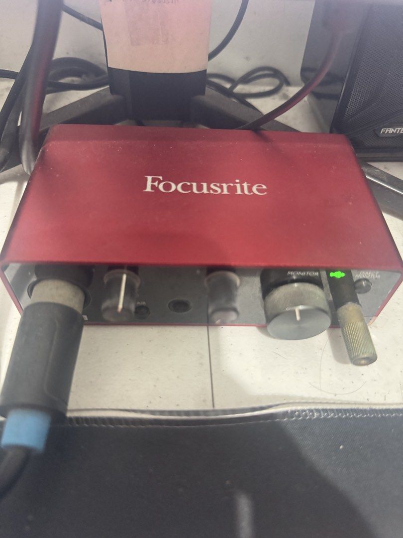 Focusrite Scarlett Audio Interface and Takstar SM-8B Microphone (Category: Microphones) located in Quezon City. Submitted by jamesronqs (Listing ID 1470104970, Image 1). Description: Selling my Focusrite audio interface with gain knobs and monitor control and it includes the Takstar SM-8B condenser microphone in a dark grey metallic finish with a mount clamp. - Includes input cable, ready to use - Ideal setup for recording vocals and instruments 