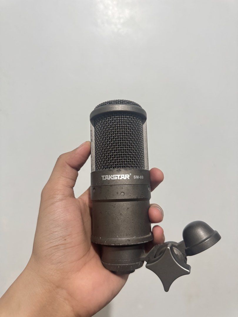 Focusrite Scarlett Audio Interface and Takstar SM-8B Microphone (Category: Microphones) located in Quezon City. Submitted by jamesronqs (Listing ID 1470104970, Image 2). Description: Selling my Focusrite audio interface with gain knobs and monitor control and it includes the Takstar SM-8B condenser microphone in a dark grey metallic finish with a mount clamp. - Includes input cable, ready to use - Ideal setup for recording vocals and instruments 