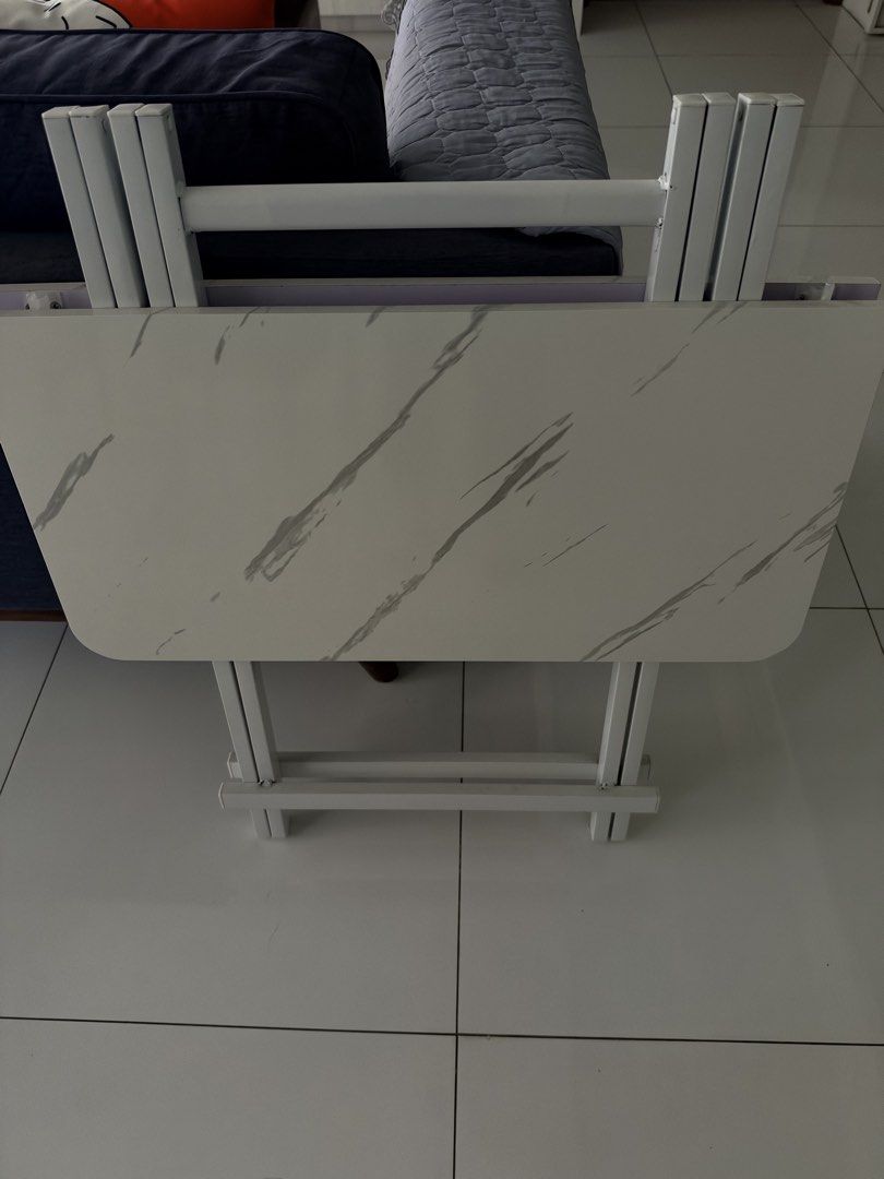Foldable Table (Category: Tables & Sets) located in Singapore. Submitted by jochias (Listing ID 1469948671, Image 2). Description: Width 70cm Depth 70cm Height 74cm Foldable table Self collect .