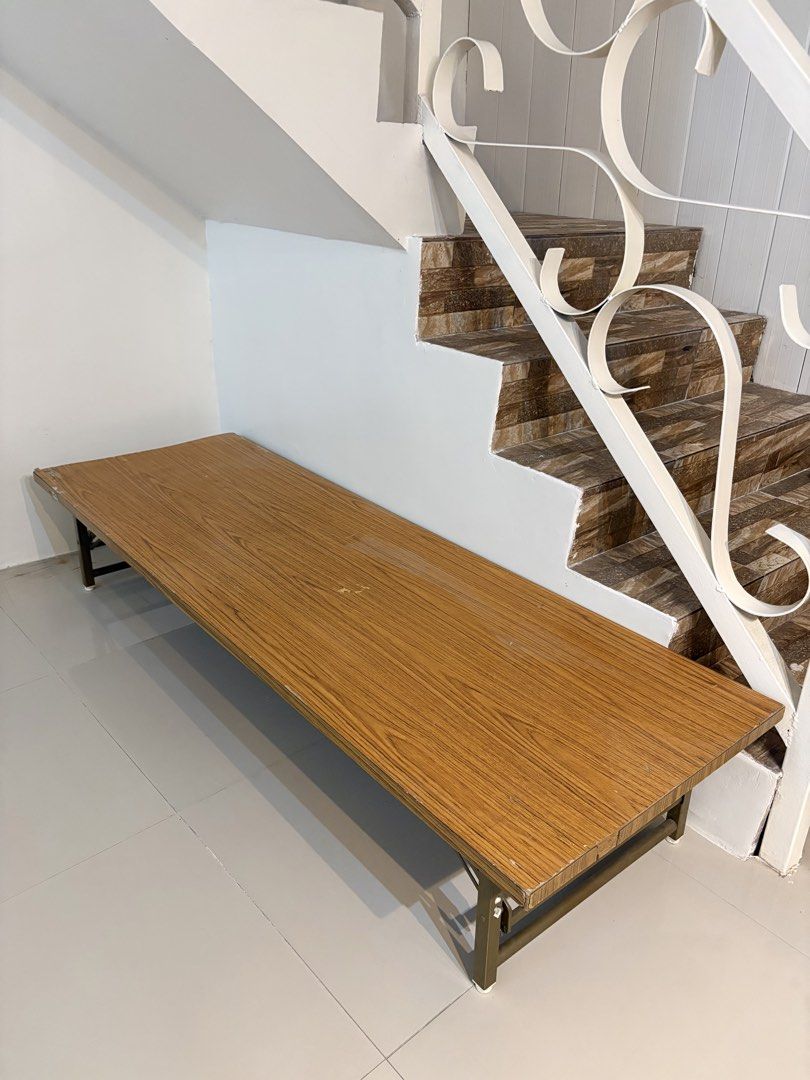 FOR SALE: TRUSCO Foldable Low Table (Category: Tables & Sets) located in Binangonan. Submitted by polinn.xx (Listing ID 1470027336, Image 3). Description: ✅ Wooden-style tabletop ✅ Sturdy metal frame ✅ Low-profile, space-saving design ✅ Neutral wood finish that matches different interiors ✅ See last photo on how i used the table :)) Length 71inch Width 23 1/2inch Height 13inch With issue, see the actual photos for reference. 💌 ₱ 1,000 only!.