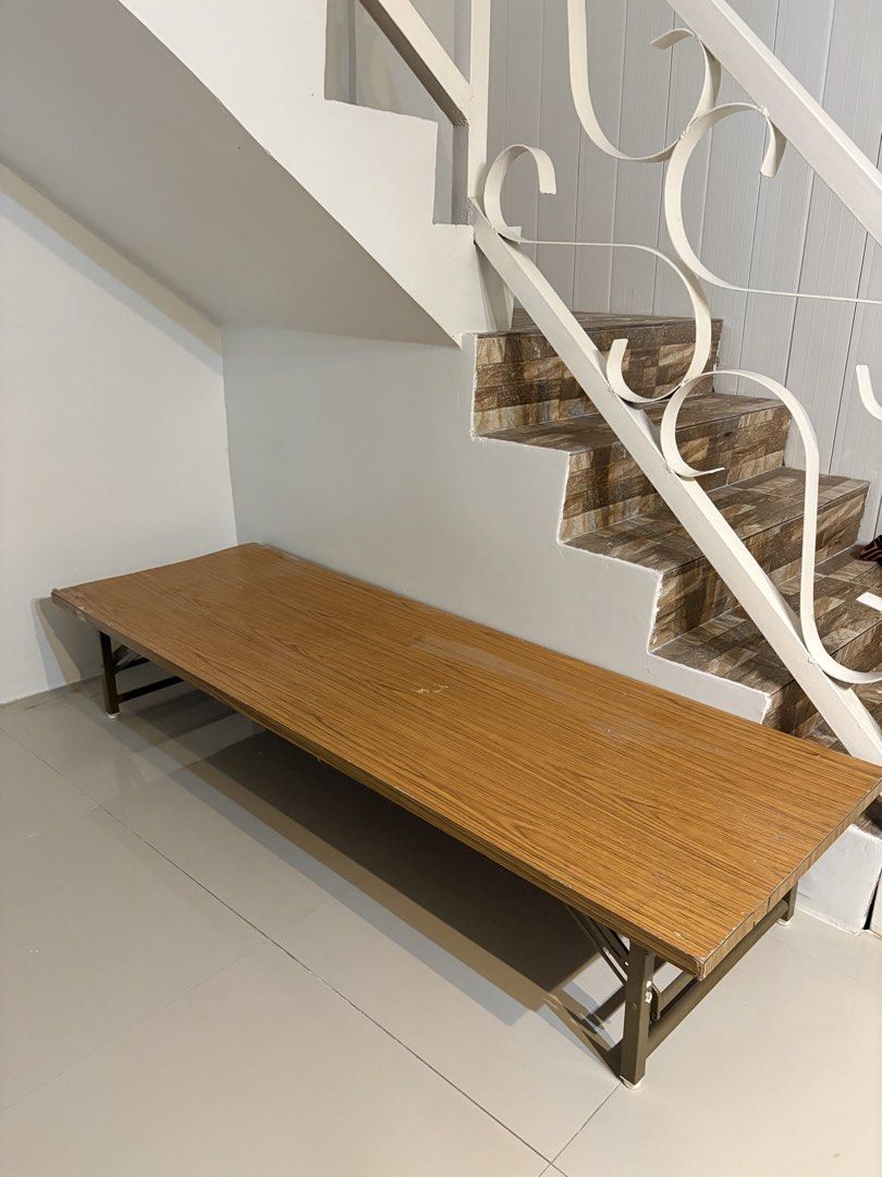 FOR SALE: TRUSCO Foldable Low Table (Category: Tables & Sets) located in Binangonan. Submitted by polinn.xx (Listing ID 1470027336, Image 2). Description: ✅ Wooden-style tabletop ✅ Sturdy metal frame ✅ Low-profile, space-saving design ✅ Neutral wood finish that matches different interiors ✅ See last photo on how i used the table :)) Length 71inch Width 23 1/2inch Height 13inch With issue, see the actual photos for reference. 💌 ₱ 1,000 only!.