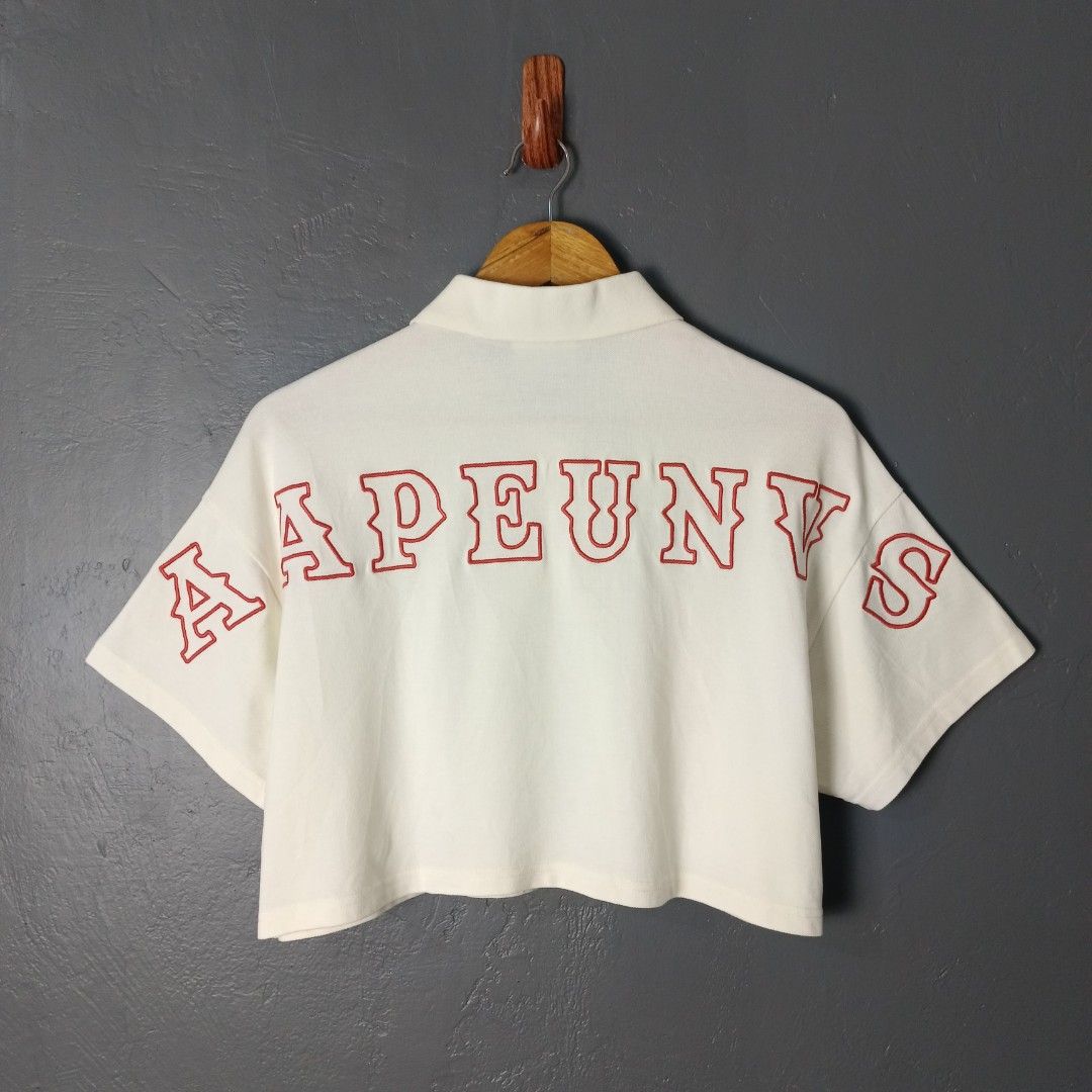 For Women - AAPE - Cropped Polo (Category: Shirts) located in Bacolod City. Submitted by drop.ph (Listing ID 1469953423, Image 1). Description: AAPE - Cropped Polo - Embroidered Authentic *Oversized Cropped Polo *Size XXS - Width - 22 , Length - 16 *Excellent Cloth *Minor stain *Price: 880php *Add SF if outside Bacolod City.
