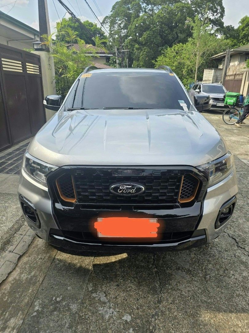 Ford Ranger (Category: Used Cars) located in Pasig City. Submitted by caloy135 (Listing ID 1470049879, Image 3). Description: 2022 Ford Ranger Wildtrak 4x2 2.0L Turbo Diesel Engine 6-Speed Automatic Transmission Push Start Button Smart Keyless Entry 41+k mileage Casa Maintained (with records) Leather Interior Dual-Zone Climate Control SYNC Infotainment System 8-Inch Touchscreen Display Apple CarPlay & Android Auto Bluetooth / USB Connectivity Rev