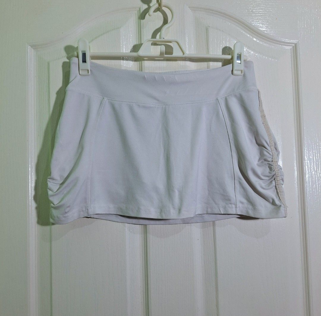 Forever 21 White Athletic Skort Size M (Category: Activewear) located in San Pablo. Submitted by allyourbrandedneeds (Listing ID 1470139392, Image 2). Description: - Brand/Model: Forever 21 Activewear Skort - Size: Medium - Color: White with contrast tape trim - Built-in shorts for extra coverage and comfort - Convenient small zipper pocket at the waistband for keys or cards - Stretchy, breathable fabric designed for easy movement - Perfect for t