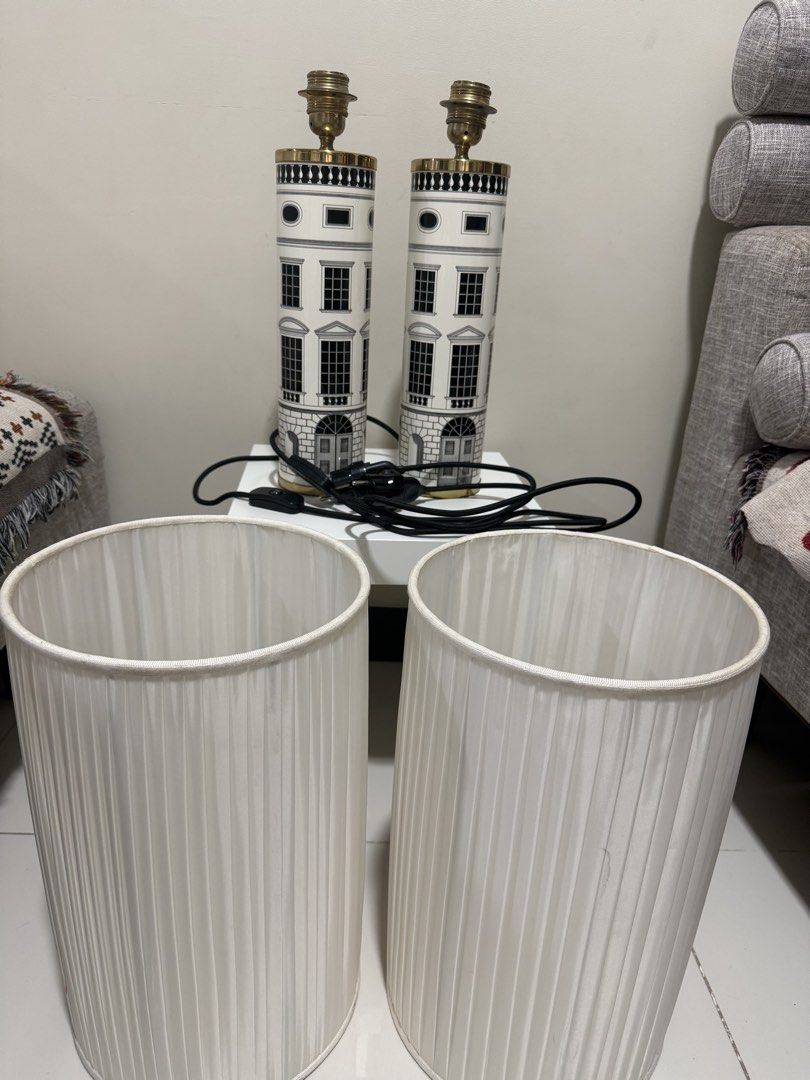Fornasetti Architettura Table Lamps Pair (Category: Lighting) located in Mandaluyong City. Submitted by dondits4sale (Listing ID 1469983606, Image 2). Description: ✨ **AUTHENTIC FORNASETTI LAMP | PRE-LOVED DESIGNER PIECE** ✨ Looking for a unique statement piece to elevate your home? 🤍 I’m letting go of my **authentic Fornasetti lamp**, a beautiful designer piece that combines artistic architectural illustrations with an elegant pleated white lam