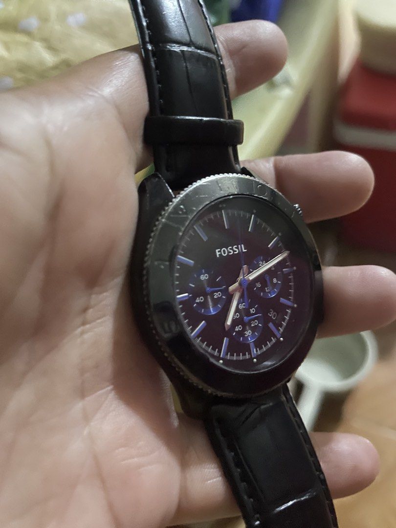 Fossil Chronograph Black Leather Watch CH2792 (Category: Men's Watches) located in Quezon City. Submitted by mizzyoumee (Listing ID 1469987420, Image 3). Description: - Brand: Fossil - Model: CH2792 - Color: All black with striking blue dial accents - Strap: Black leather with crocodile texture and standard buckle closure - Features: Textured bezel, 3 sub-dials, white hour and minute hands, and right-side push buttons - Water Resistance: 5ATM sta
