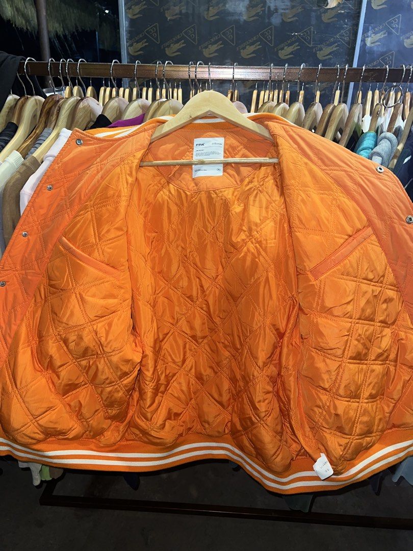 FPA Orange & White Quilted Bomber Varsity Jacket (Category: Coats, Jackets and Outerwear) located in Luna. Submitted by lareign (Listing ID 1470080642, Image 3). Description: -600 free ship na - Size: XL (25-26x28) - Closure: Snap-buttons - Details: Striped ribbed collar, cuffs, and hem - Embroidery designs - Interior: Quilted orange lining with convenient pockets -9.5/10 color rate.