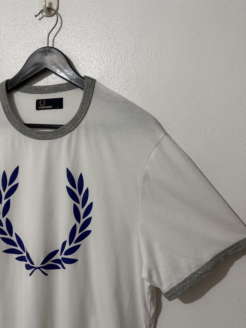 Fred Perry Big Logo Tee - White (Category: Tshirts & Polo Shirts ) located in Caloocan City. Submitted by thriftingbanana (Listing ID 1470073572, Image 3). Description: Excellent No issue Large Width 21 inches Length 28 inches.