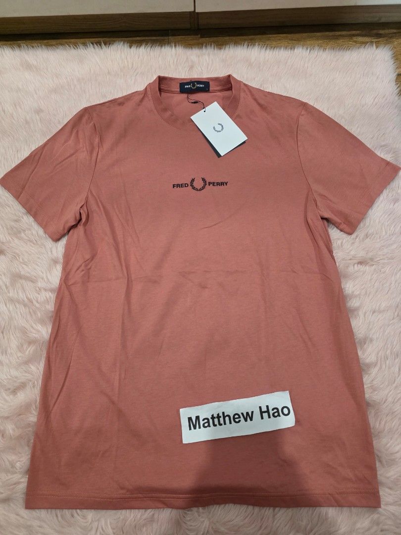 Fred perry embroided tshirt (Category: Tshirts & Polo Shirts ) located in Manila. Submitted by machoxmatt (Listing ID 1469966748, Image 2). Description: brandnew size: small (w19, L27) color: putty pink mop:bdo/gcash shipping at buyer's expense.