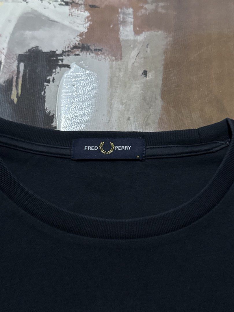Fred Perry tshirt (Category: Tshirts & Polo Shirts ) located in Las Pinas. Submitted by thrftmnl. (Listing ID 1469963316, Image 3). Description: Fred Perry tshirt Size: Medium Dimes Width: 22 Length: 26 Issue: 2 pinhole (last slide) not noticeable .