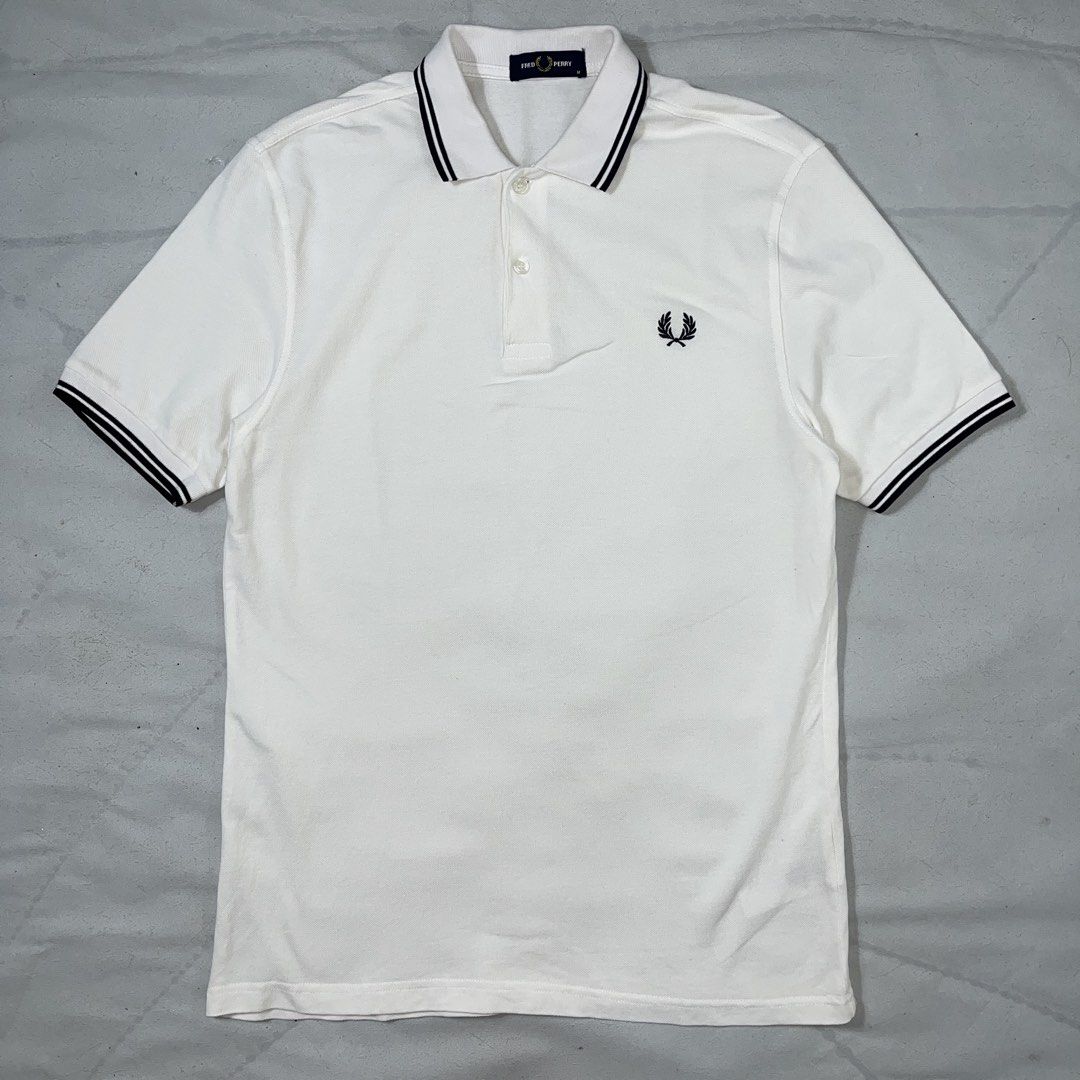 Fred Perry Twintipped White Poloshirt (Category: Tshirts & Polo Shirts ) located in Nasugbu. Submitted by janstuffs.ph (Listing ID 1470111174, Image 1). Description: 💯Legit! Size: Medium on tag Width: 19" Length: 27" Condition: 10/10 Good as new Flaw: NONE Mine: 1680 •Buyer shoulder shipping fee - ship via j&t. •Read details before purchasing..