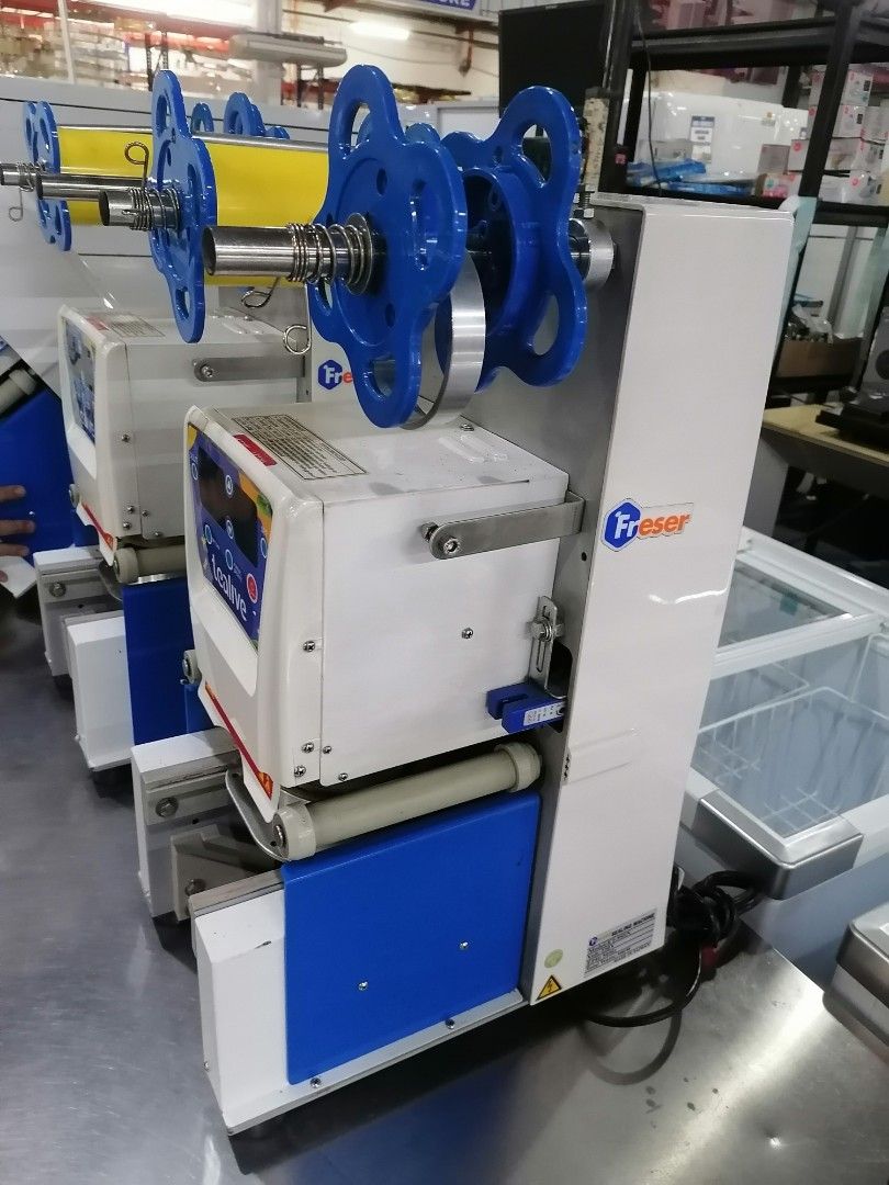 Freser ET-95SN Cup Sealing Machine USED (Category: Coffee Machines & Makers) located in Muntinlupa City. Submitted by fast_bryantorrentefernand (Listing ID 1470057945, Image 2). Description: - Model: Freser ET-95SN cup sealer machine (Made in Taiwan) - Condition: Commercial heavy-duty build, ideal for bubble tea and beverage shops - Display: Digital control panel with Tealive branding and adjustable settings for temperature, sealing time, and fil