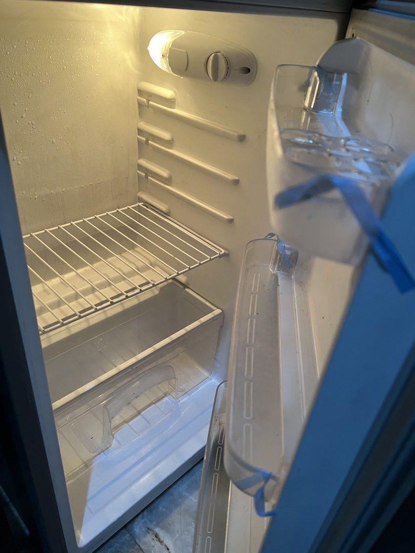 Fujidenzo RDD-50S Two Door Refrigerator (Category: Refrigerators and Freezers) located in Quezon City. Submitted by swiftiesince08 (Listing ID 1470010249, Image 3). Description: - Brand/Model: Fujidenzo RDD-50S Two-Door Mini Refrigerator - Color: Sleek Dark Grey exterior with white interior - Storage: Wire shelves, bottom crisper drawer, freezer shelf, and convenient door bins on both doors - Performance: Energy efficient and heavy-duty build - C