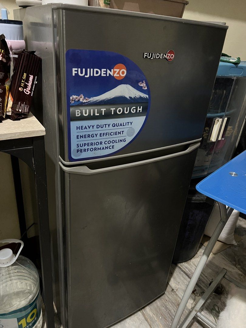 Fujidenzo RDD-50S Two Door Refrigerator (Category: Refrigerators and Freezers) located in Quezon City. Submitted by swiftiesince08 (Listing ID 1470010249, Image 1). Description: - Brand/Model: Fujidenzo RDD-50S Two-Door Mini Refrigerator - Color: Sleek Dark Grey exterior with white interior - Storage: Wire shelves, bottom crisper drawer, freezer shelf, and convenient door bins on both doors - Performance: Energy efficient and heavy-duty build - C