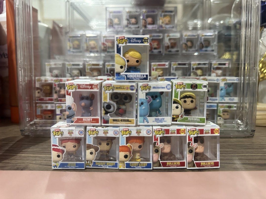 Funko Bitty Pop! Disney and Pixar Mini Figures (Category: Designer & Blind Box Toys) located in Manila. Submitted by randomclothing (Listing ID 1470033996, Image 2). Description: FUNKO BITTY POP❗️(smallest funko) Selling my dupes or trade. Disney Princess • Cinderella - 200 Toy Story (1k Take all) • Jessie - 220 • Woody - 220 • Gabby Gabby - 250 • Bullseye (2x) - 230 Pixar (800 take all) • Sulley - 200 • Wall-E - 200 • Remy - 250 • Russell - 250 