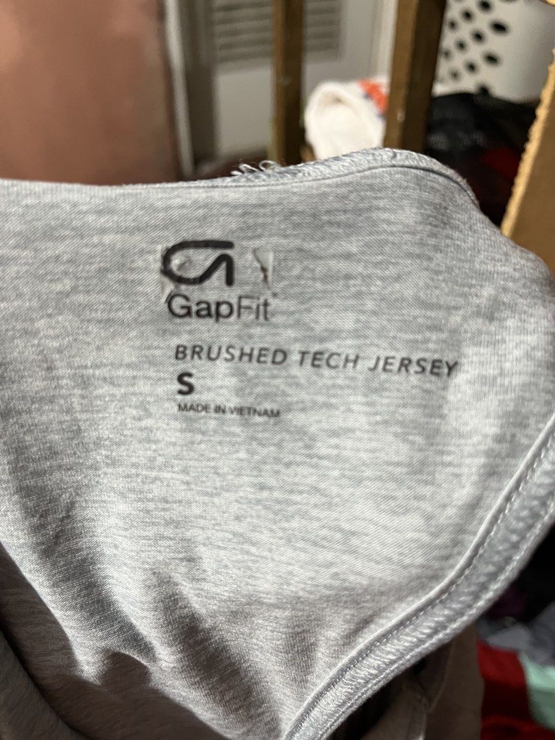 GapFit Brushed Tech Jersey Long Sleeve Top Grey S (Category: Longsleeves) located in Marikina City. Submitted by sakura_07 (Listing ID 1470136876, Image 3). Description: - Brand: GapFit - Item: Long sleeve active top - Color: Grey - Size: Small - Material: Soft brushed tech jersey - Features: Round neckline, cinched drawstring hem, and open keyhole back cutout - Condition: Clean, lightweight, and comfortable for workouts or casual days.