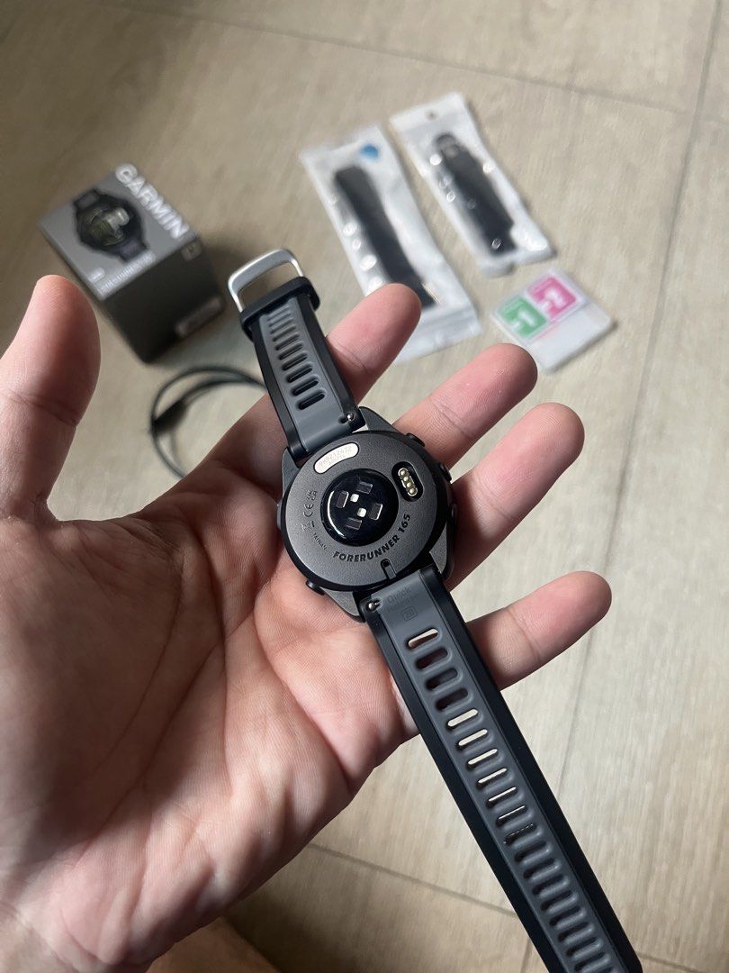 Garmin Forerunner 165 (Non Music) (Category: Wearables & Smart Watches) located in Bacoor. Submitted by l00pa (Listing ID 1470002872, Image 3). Description: Garmin Forerunner 165 (Non Music) Bought last June 29, 2026 - with box and charging cable - includes an extra plain black silicone strap and a plain black nylon strap - extra tempered glass RFS: Upgraded .