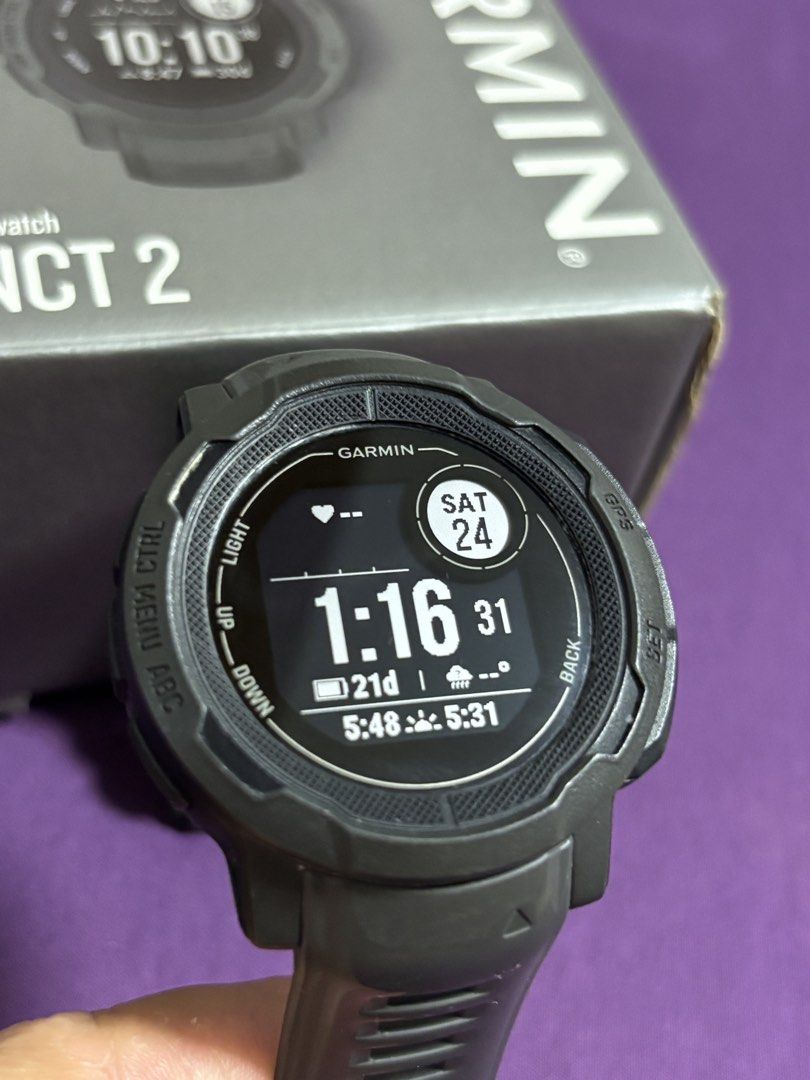 Garmin Instinct 2 Rugged GPS Smartwatch (Category: Wearables & Smart Watches) located in Taguig. Submitted by karlas.closet (Listing ID 1469996612, Image 2). Description: - For Sale: Garmin Instinct 2 Rugged GPS Smarwatch - Complete with charging cable, manual and original box. - Best for outdoor sports like running, hiking, trail running, swimming and strength training in the gym. - Fully functional. Zero technical defect. - Only a cut on one bu