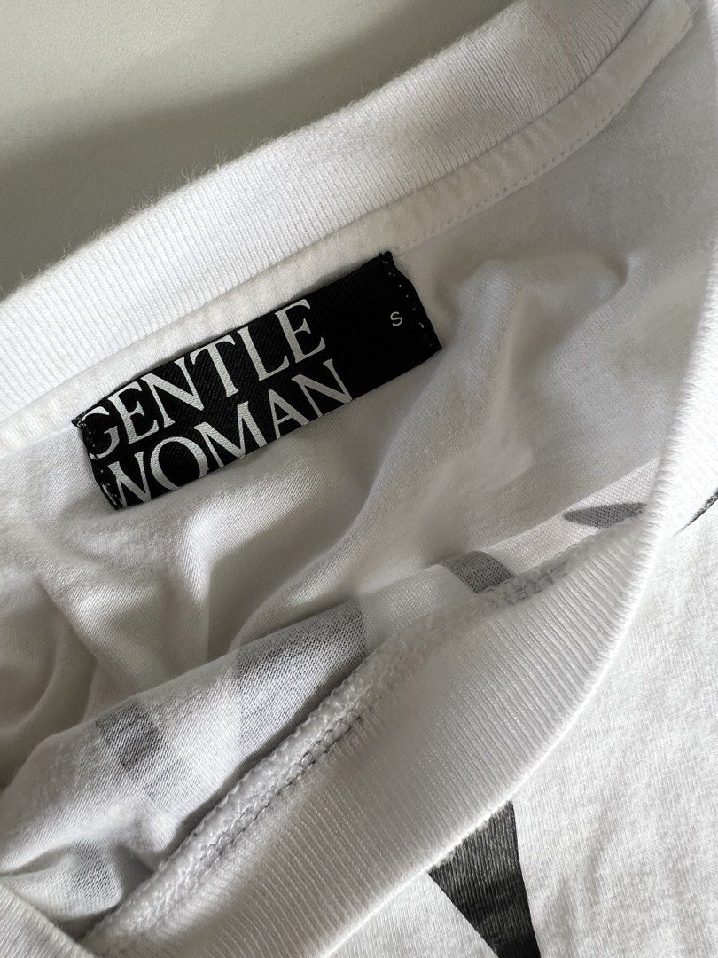 Gentle Woman Cropped Shirt AUTHENTIC (Category: Shirts) located in Santiago. Submitted by ricevllnz (Listing ID 1469955744, Image 2). Description: Negotiable! Statement-making oversized graphic tee for an effortlessly cool, casual look. • Brand: Gentle Woman • Size: Small (S) can fit up to semi Med • Color: White with bold black lettering • Design: Large front graphic print • Style: Casual streetwear • Condition: Pre-loved Bought in Bangkok GW st