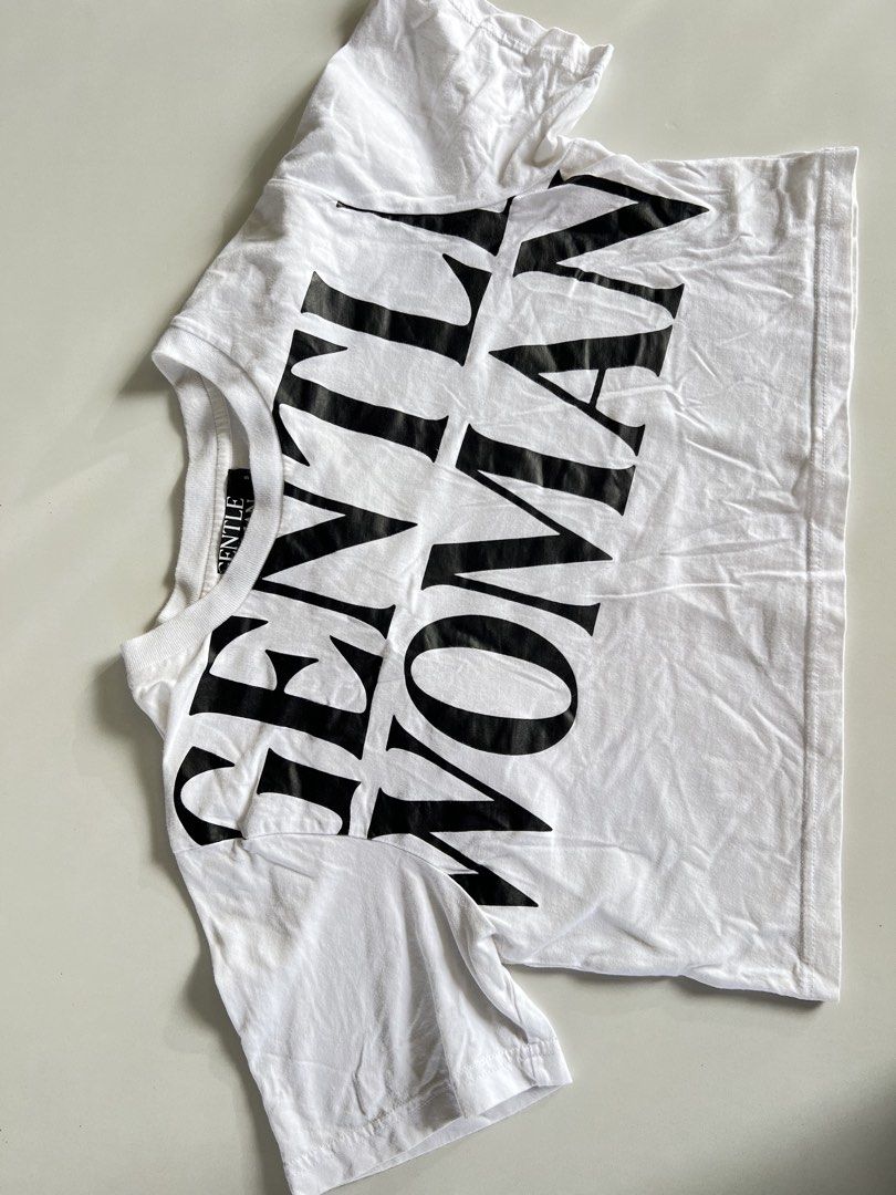 Gentle Woman Cropped Shirt AUTHENTIC (Category: Shirts) located in Santiago. Submitted by ricevllnz (Listing ID 1469955744, Image 3). Description: Negotiable! Statement-making oversized graphic tee for an effortlessly cool, casual look. • Brand: Gentle Woman • Size: Small (S) can fit up to semi Med • Color: White with bold black lettering • Design: Large front graphic print • Style: Casual streetwear • Condition: Pre-loved Bought in Bangkok GW st