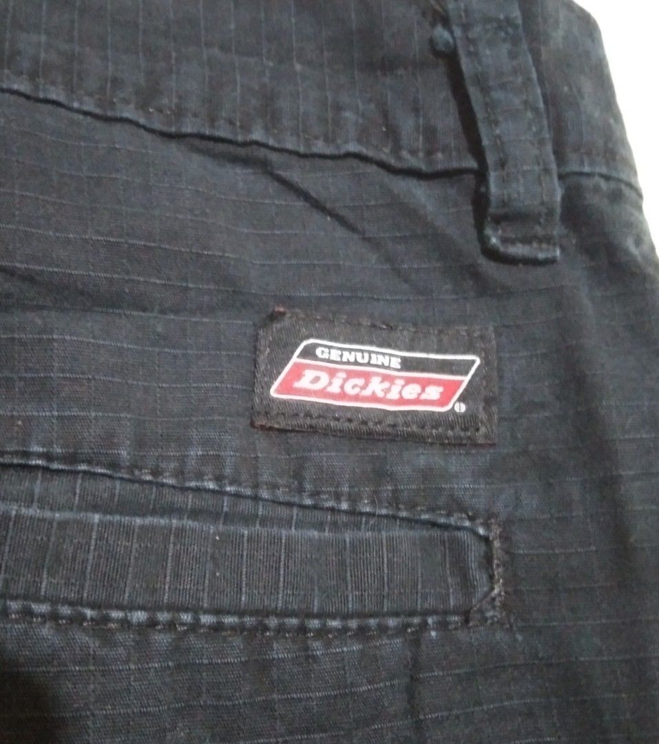 Genuine Dickies Black Cargo Shorts Size 34 (Category: Shorts) located in Manila. Submitted by aj.bermundo (Listing ID 1470026247, Image 3). Description: - Brand: Genuine Dickies - Size: 34 - Color: Black - Material: 100% cotton grid fabric - Closure: Button closure with zip fly - Pockets: Standard side pockets and rear patch pocket with Dickies label - Origin: Made in Nicaragua.