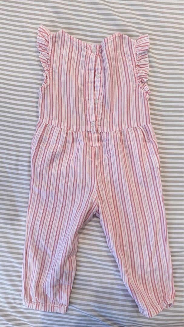 Gingersnaps Tiny Pink Striped Smocked Bird Romper Size 12 (Category: Babies & Kids Fashion) located in General Trias. Submitted by dphazel (Listing ID 1470044996, Image 2). Description: - Brand: Gingersnaps Tiny - Size: 12 Months (best fit 9-12mos) - Color/Pattern: Pink and white striped - Details: Smocked bodice with embroidered bird and leaf design, ruffle shoulder trim, and side pockets - Convenience: Back button closure and snap buttons along
