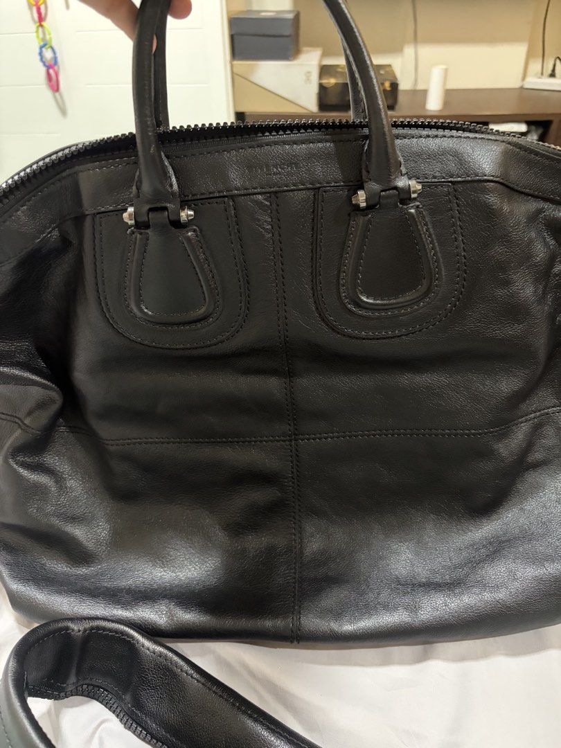 Givenchy antigona XL travel bag (Category: Luxury Bags & Wallets) located in Makati City. Submitted by rnathaliem (Listing ID 1469980610, Image 1). Description: Givenchy Biker duffle bag in Black calfskin.