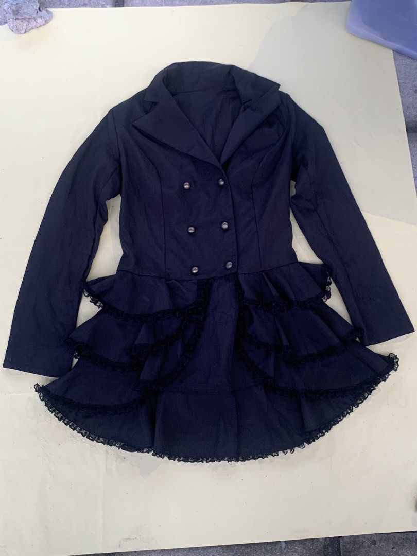 Gothic Medieval Tailcoat (Category: Coats, Jackets and Outerwear) located in Caloocan City. Submitted by thriftz2.spaze (Listing ID 1469999109, Image 3). Description: 34x32 (Width, Length) Sleeves — 27 in 🌀 Structured blazer top with tailored notched lapels, a double-breasted button configuration, and a high-low asymmetrical peplum hemline. 🌀 Usually cut from mid-stretch, lightweight synthetic blends like 85% polyester. perfect for your cosplay