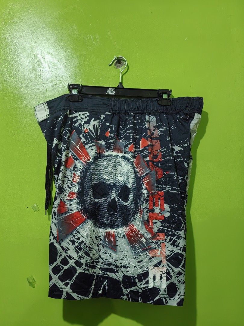 Graphic Skull Print Board Shorts XL (Category: Swim Trunks & Board Shorts) located in Manila. Submitted by adrianaban04817 (Listing ID 1470062914, Image 1). Description: Y2K Board Short MMA ELITE SIZ XL size 40-22.2 Leg 14 no issue wash only.