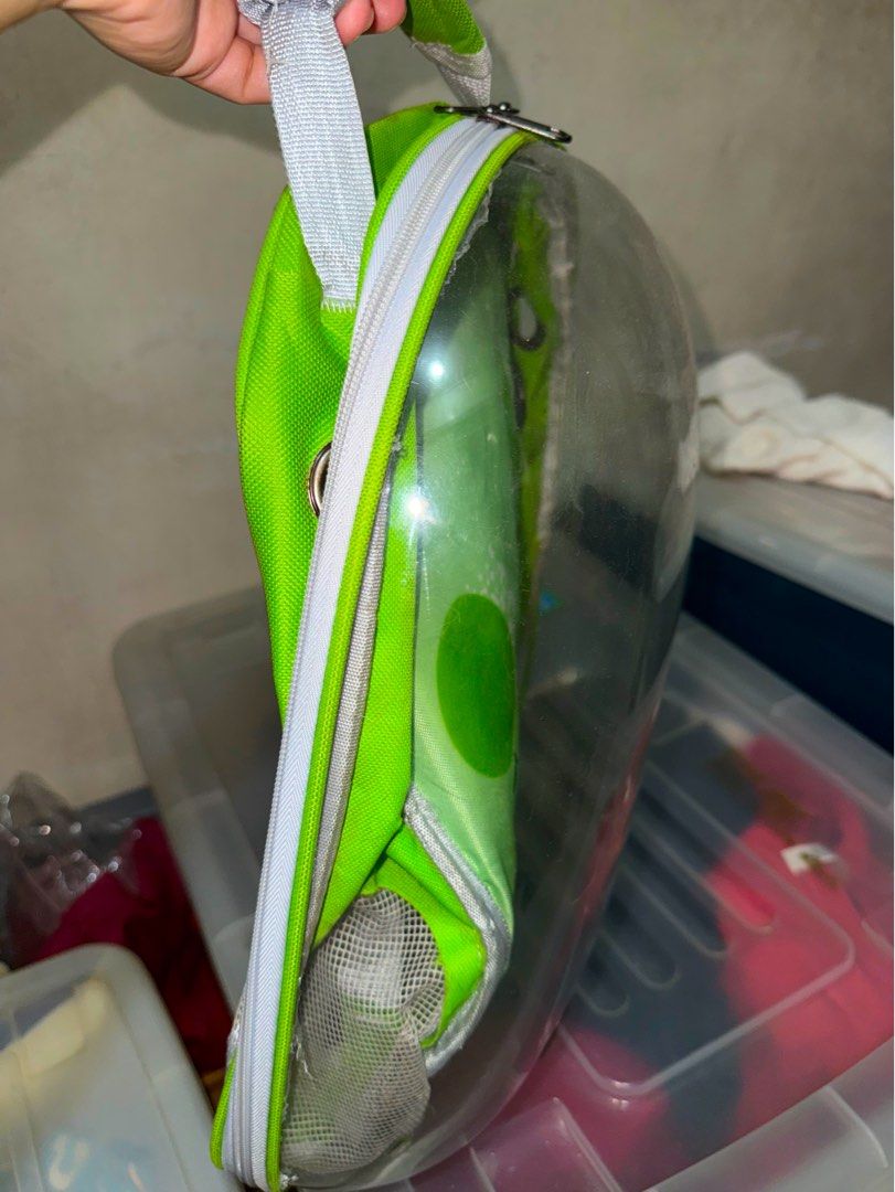 Green Apple Pattern Pet Carrier Backpack Bubble Capsule (Category: Backpacks) located in Mandaluyong City. Submitted by jeyviee (Listing ID 1470044099, Image 1). Description: - Adorable green pet backpack featuring a clear front bubble shell with an apple pattern - Well-ventilated with breathable mesh side pockets and bottom front grommets - Comfortable to wear with padded adjustable shoulder straps and a secure chest clip - Convenient top carry 