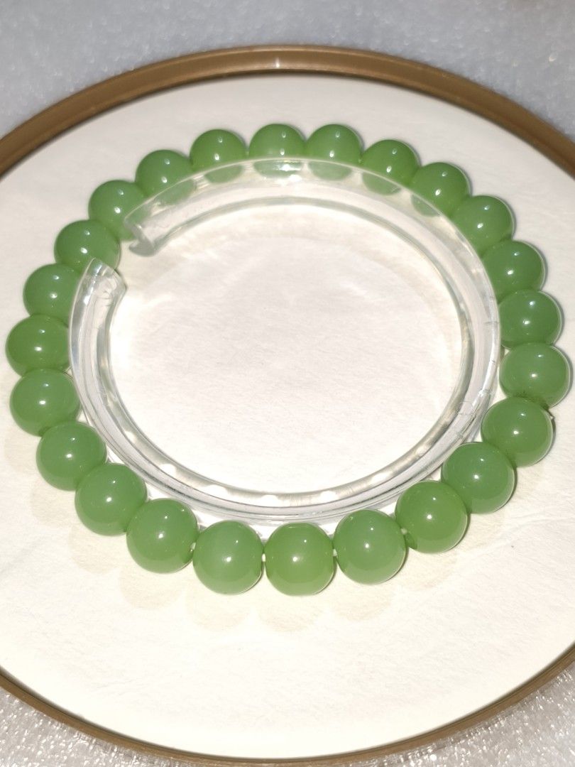 Green Jade Bead Bracelet (Category: Bracelets) located in Caloocan City. Submitted by books_and_beads (Listing ID 1470116345, Image 1). Description: Features a fresh, vibrant green color with a smooth, waxy luster. Known as a stone of calm and protection, this is a substantial, elegant piece perfect for everyday wear or stacking 🔍 Identification · Stone: Likely Xiuyu Jade (also known as Xiuyan Jade or Serpentine) or a similar light green Nephrit