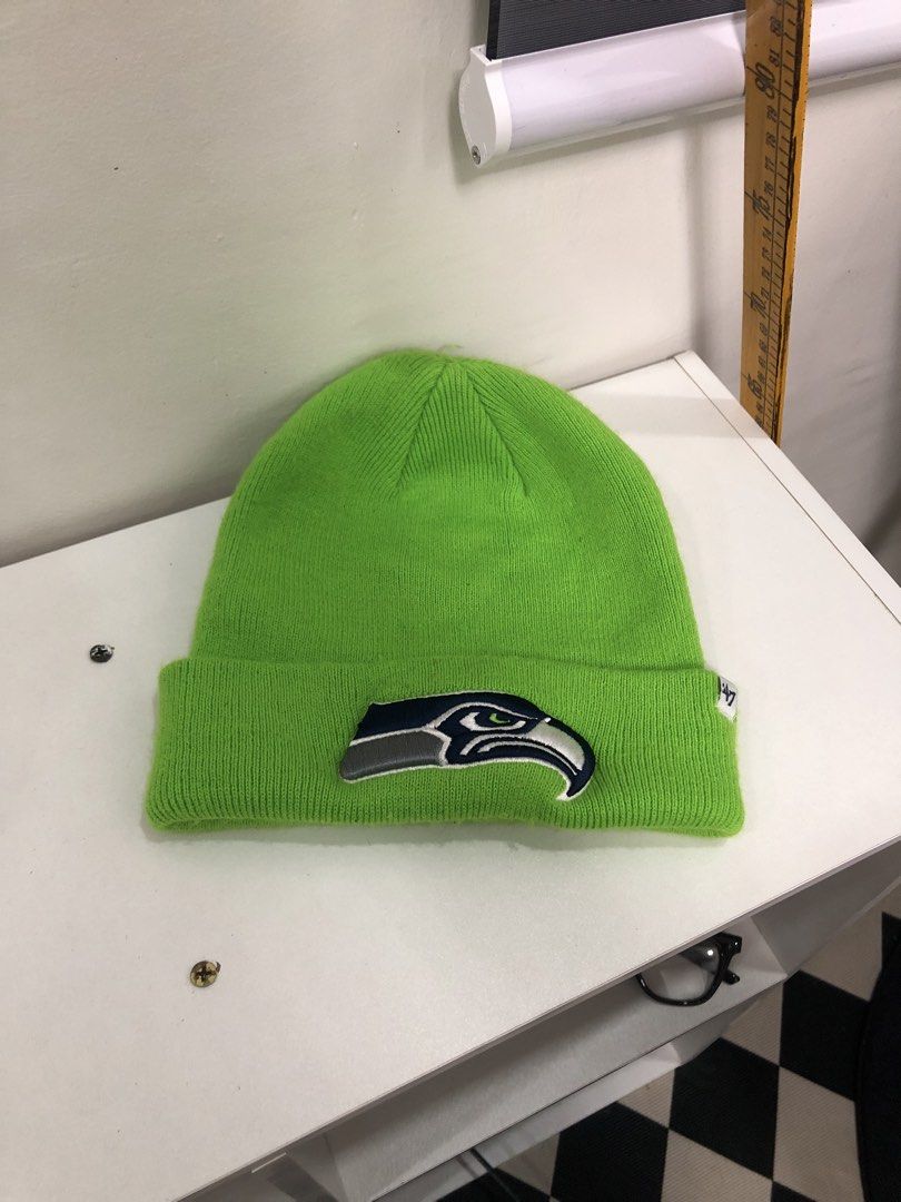 Green Seattle Seahawks 47 Beanie (Category: Caps & Hats) located in Manila. Submitted by ejaay_2012 (Listing ID 1470103239, Image 1). Description: - Brand: '47 Brand (Official NFL Team Apparel) - Team: Seattle Seahawks - Color: Bright Green - Size: One size fits all - Material: 100% acrylic for warmth - Design: Embroidered team logo on folded cuff - Condition: Clean and vibrant, ideal for game days or cold weather.