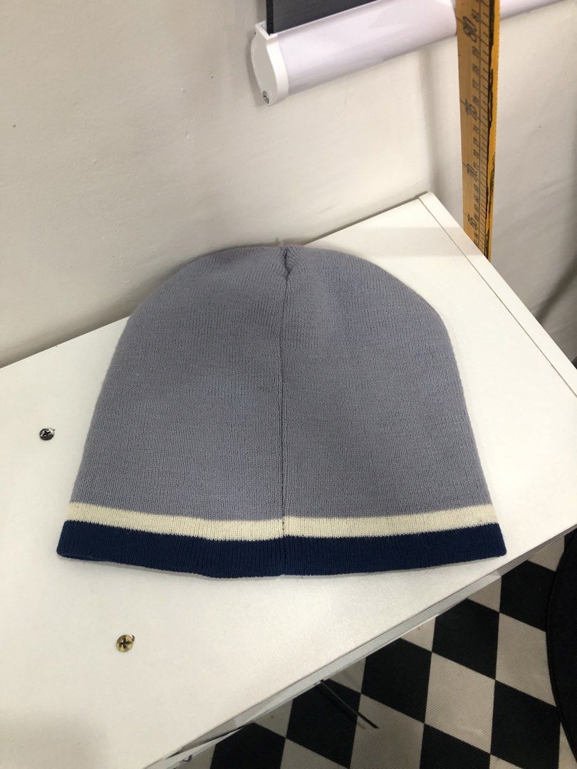 Grey Oilers Beanie (Category: Caps & Hats) located in Manila. Submitted by ejaay_2012 (Listing ID 1470103568, Image 2). Description: - Official NHL merchandise featuring embroidered Edmonton Oilers logo - Stylish grey design with navy blue and white stripes - Made with soft 100% acrylic knit material for maximum comfort - Keeps you warm during game days or cold weather - Brand new with tags attached.