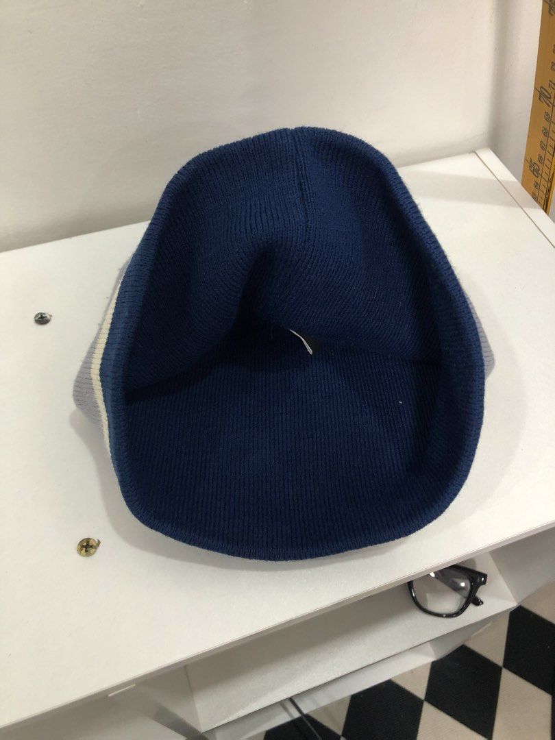 Grey Oilers Beanie (Category: Caps & Hats) located in Manila. Submitted by ejaay_2012 (Listing ID 1470103568, Image 3). Description: - Official NHL merchandise featuring embroidered Edmonton Oilers logo - Stylish grey design with navy blue and white stripes - Made with soft 100% acrylic knit material for maximum comfort - Keeps you warm during game days or cold weather - Brand new with tags attached.