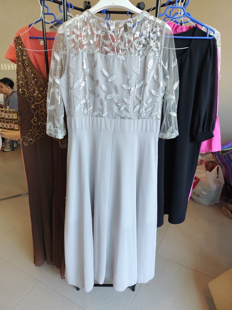 Grey silver leaf embroidered midi dress size 4XL (Category: Dresses) located in Makati City. Submitted by pengdwin (Listing ID 1470035366, Image 2). Description: - Style: Grey midi dress with sheer mesh top half - Details: Silver leaf embroidery and sequins on bodice and sleeves - Fit: Three-quarter sleeves, fitted waistline, solid skirt falling below the knee - Size: 4XL - Condition: Brand new / Excellent (ready to ship!) - Mode of Payment: GCas