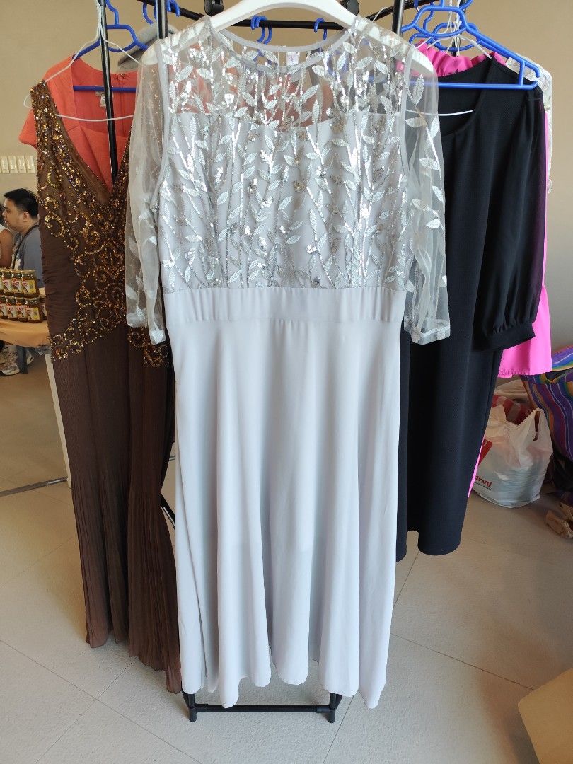 Grey silver leaf embroidered midi dress size 4XL (Category: Dresses) located in Makati City. Submitted by pengdwin (Listing ID 1470035366, Image 1). Description: - Style: Grey midi dress with sheer mesh top half - Details: Silver leaf embroidery and sequins on bodice and sleeves - Fit: Three-quarter sleeves, fitted waistline, solid skirt falling below the knee - Size: 4XL - Condition: Brand new / Excellent (ready to ship!) - Mode of Payment: GCas
