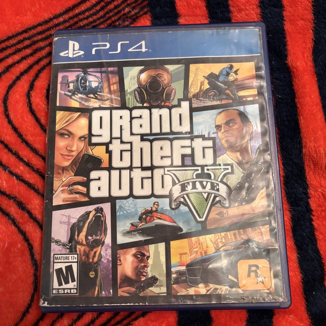 GTA 5 (Category: PlayStation) located in Manila. Submitted by gabzxz (Listing ID 1470021696, Image 1). Description: 🎮 FOR SALE: GTA V – PS4 ORIGINAL DISC 🎮 💿 Game: Grand Theft Auto V (GTA 5) 🎮 Platform: PlayStation 4 (PS4) 📦 With original case ✅ Disc included 📌 Condition: Used, may visible scratches kaya as-is ang bentahan. 💰 PRICE: 500 ✔️ Perfect para sa mahilig sa open-world games, missions, at car racing! 📍 Meet-up or delivery, depende