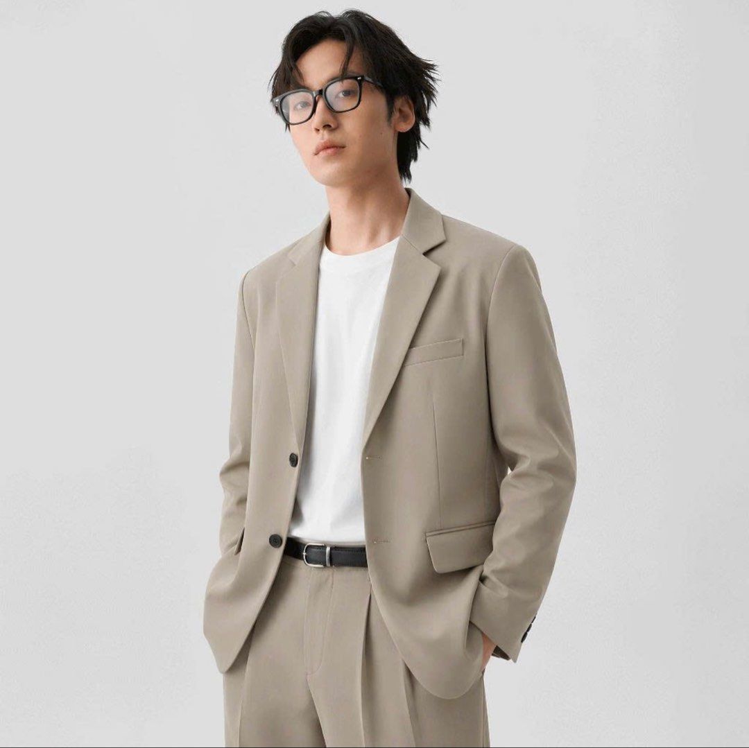 GU Blazer Coat (Category: Coats, Jackets and Outerwear) located in Cavite. Submitted by yakultjeni85475 (Listing ID 1470123086, Image 1). Description: - Brand/Style: GU beige tailored blazer - Closure: Two-button upfront - Pockets: Flap pockets at the hips and one chest pocket - Details: Classic notched lapels - Styling: Neutral tone that easily pairs with casual tees or formal shirts.