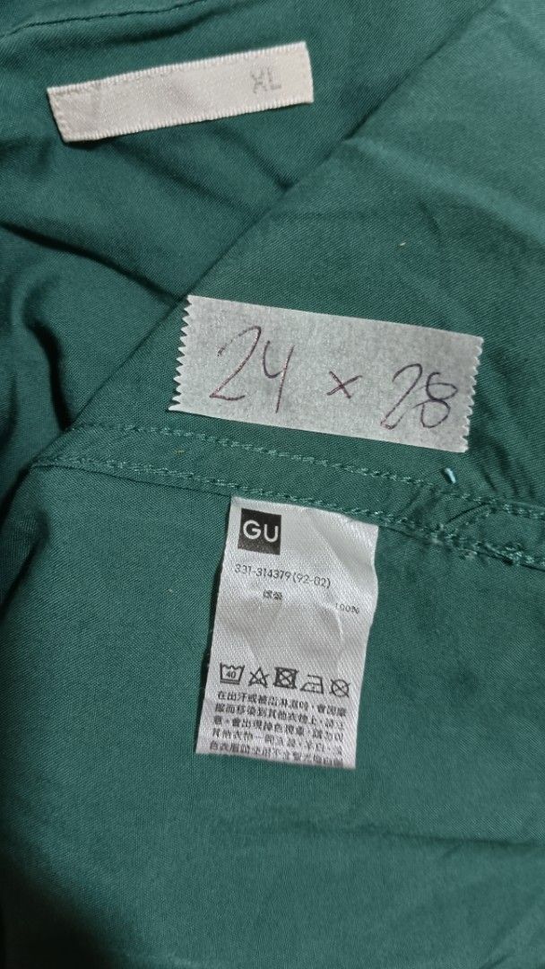 GU Green Camp Collar Short Sleeve (Category: Tshirts & Polo Shirts ) located in Manila. Submitted by zariyah.1986 (Listing ID 1470018834, Image 3). Description: - Brand: GU - Color: Green - Size: XL (Measures 24" across chest, 28" in length) - Style: Short sleeve button-down with classic camp collar - Features: Single chest pocket, standard button front closure, relaxed fit - Condition: Great for warm weather and casual wear.