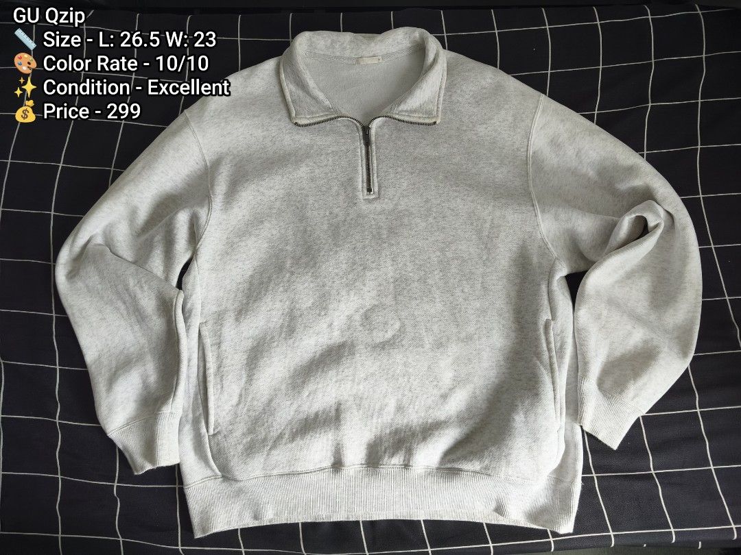 GU Q-zip Heather Grey Sweatshirt (Category: Coats, Jackets and Outerwear) located in Manila. Submitted by gelog2 (Listing ID 1469956465, Image 1). Description: - Brand: GU - Style: Quarter-zip sweatshirt with high collar and metal zipper pull - Color: Heather grey (vibrant and clean) - Material: Soft cotton blend with ribbed cuffs and hem - Features: Practical side pockets - Size: 26.5 inches (length) x 23 inches (width) - Condition: 10/10, flawl