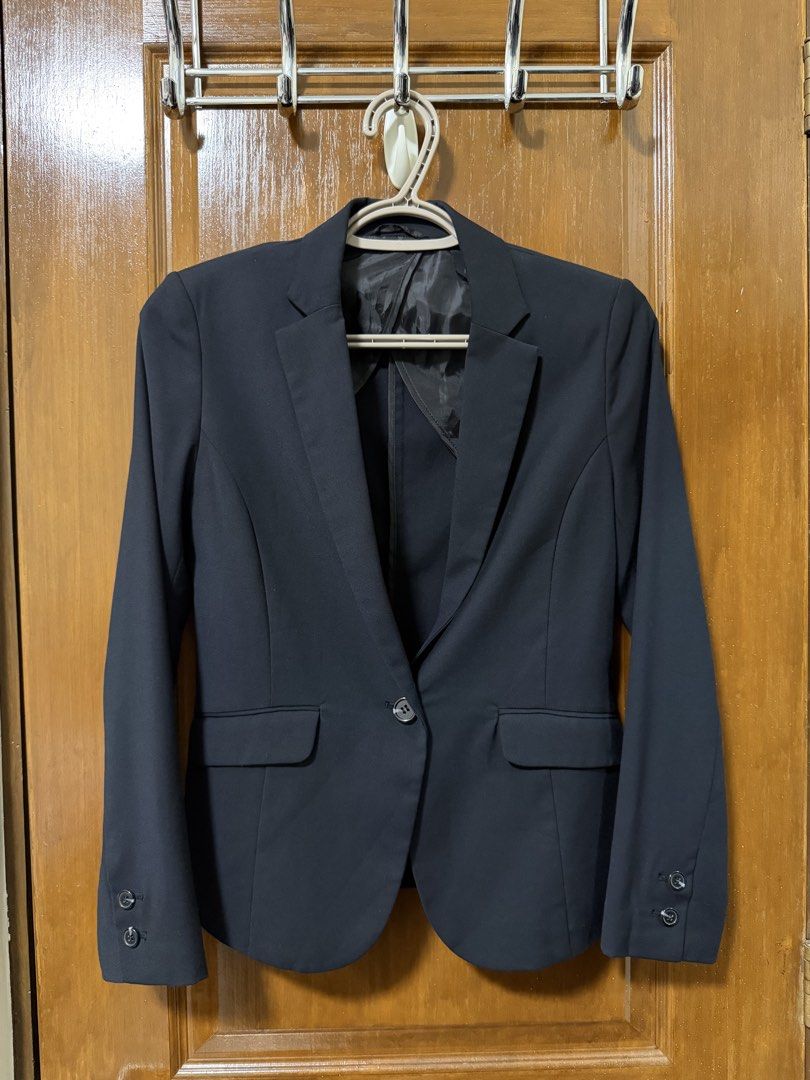 GU Women’s Tailored Blazer Size S (Category: Coats, Jackets and Outerwear) located in Bulacan. Submitted by lilthingsco (Listing ID 1470115231, Image 1). Description: - Brand/Model: GU tailored blazer - Size: Small - Color: Dark Navy Blue (almost black) - Closure & Pockets: Single-button front with functional flap pockets - Details: Chic button cuffs and back center seam for a flattering, fitted silhouette - Interior: Fully lined for comfort - Ma