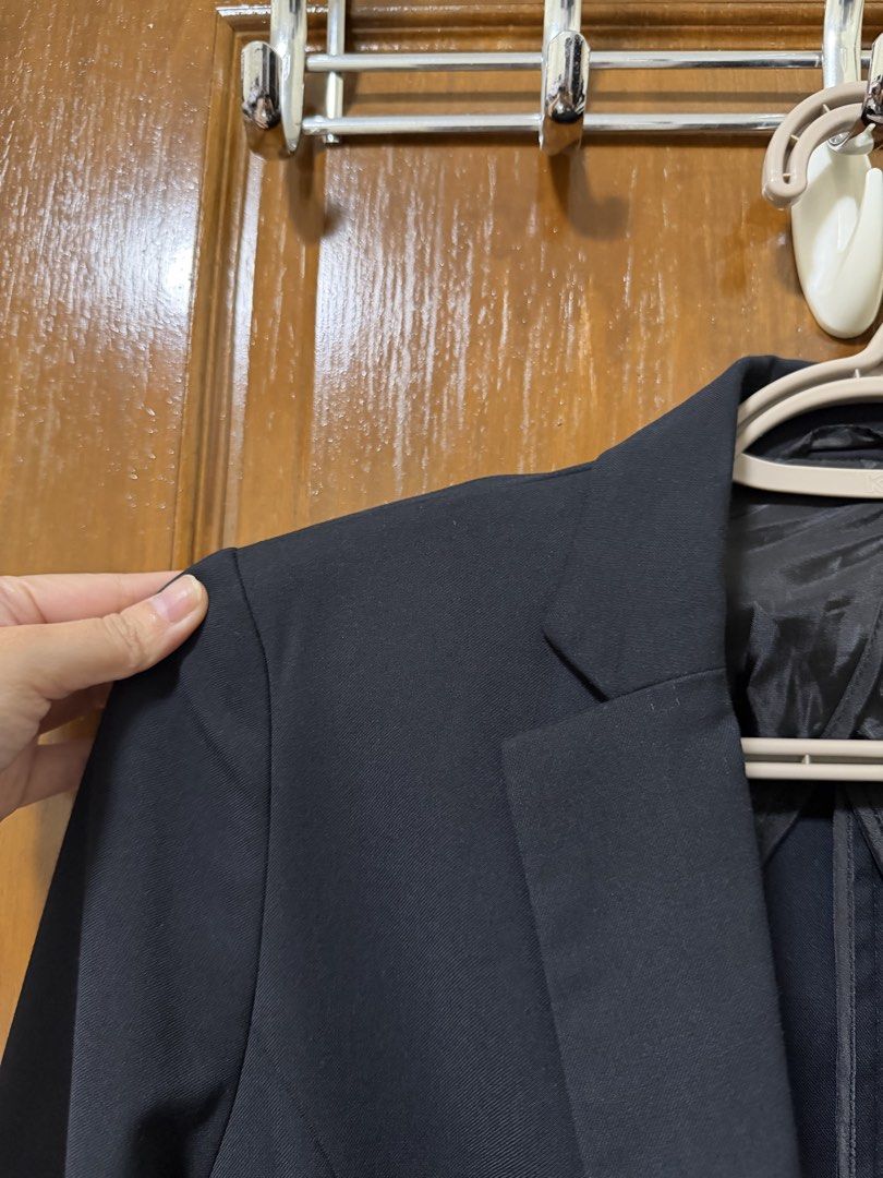 GU Women’s Tailored Blazer Size S (Category: Coats, Jackets and Outerwear) located in Bulacan. Submitted by lilthingsco (Listing ID 1470115231, Image 2). Description: - Brand/Model: GU tailored blazer - Size: Small - Color: Dark Navy Blue (almost black) - Closure & Pockets: Single-button front with functional flap pockets - Details: Chic button cuffs and back center seam for a flattering, fitted silhouette - Interior: Fully lined for comfort - Ma