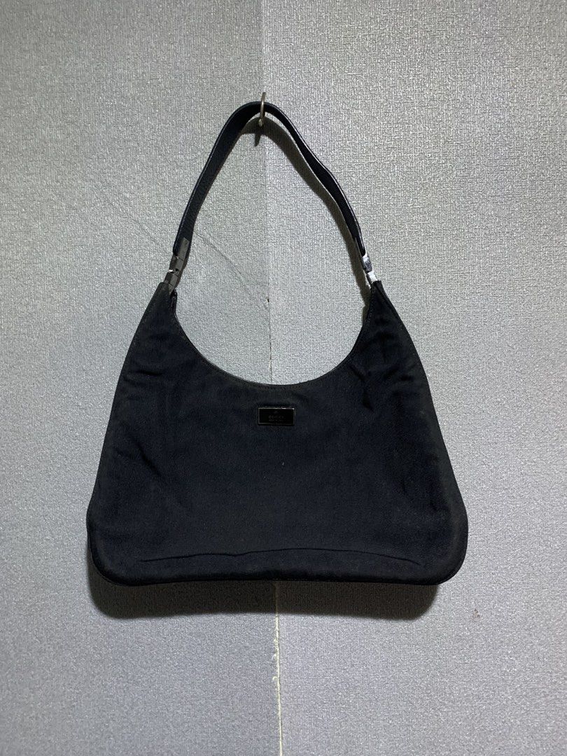 GUCCI BLACK CANVAS HOBO (Category: Luxury Bags & Wallets) located in Carmen. Submitted by bensbai (Listing ID 1470082075, Image 1). Description: - Premium quality material for long-lasting use - Stylish design suitable for daily wear or special occasions - Easy to clean and maintain - Fast shipping available nationwide.