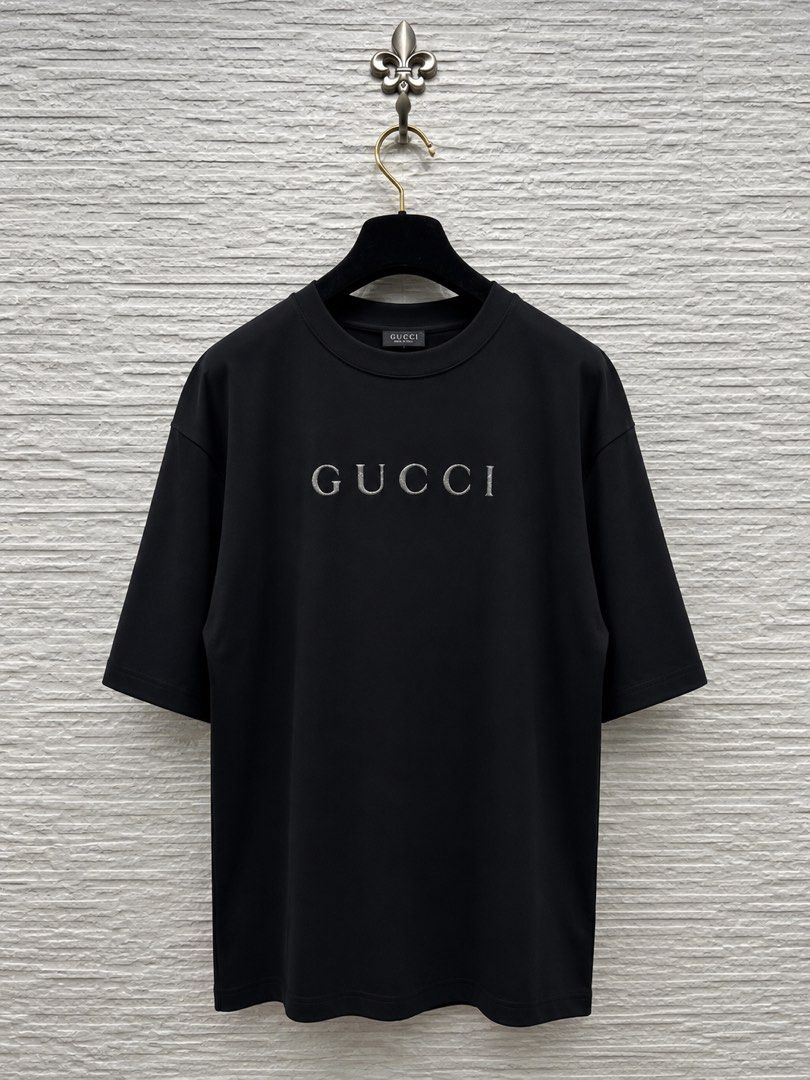 ⚜️Gucci glitter Black tshirt (Category: Luxury Apparel) located in Makati City. Submitted by 90sangel (Listing ID 1470017029, Image 1). Description: with gucci paperbag.