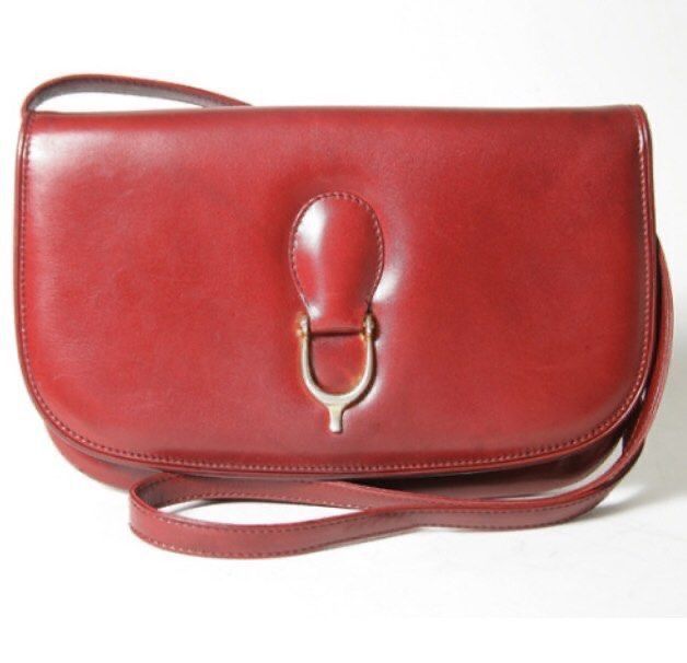 GUCCI RED LEATHER BAG (Category: Cross-body Bags) located in Marikina City. Submitted by minimalistmanila (Listing ID 1470031065, Image 2). Description: Vintage genuine Gucci red short crossbody bag or can be a clutch bag if strap is hidden. With keychain & dust bag included. Please see last post for all of the bags details and dimensions. All pics provided to show authenticity. Order now! -Can meet in Marikina for serious buyers only or book Lal