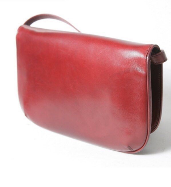 GUCCI RED LEATHER BAG (Category: Cross-body Bags) located in Marikina City. Submitted by minimalistmanila (Listing ID 1470031065, Image 3). Description: Vintage genuine Gucci red short crossbody bag or can be a clutch bag if strap is hidden. With keychain & dust bag included. Please see last post for all of the bags details and dimensions. All pics provided to show authenticity. Order now! -Can meet in Marikina for serious buyers only or book Lal